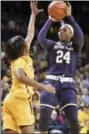  ?? DAVID RICHARD - THE ASSOCIATED PRESS ?? Notre Dame guard Arike Ogunbowale (24) shoots over Toledo guard Mikaela Boyd (2) during the second half of an NCAA college basketball game Saturday, Dec. 8, 2018, in Toledo, Ohio.