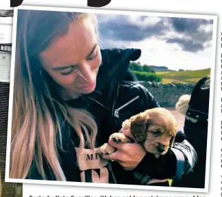  ?? ?? Custody: Kate Greville with her golden retriever puppy Mac