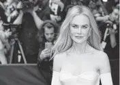  ?? JASPER COLT USA TODAY NETWORK ?? Nicole Kidman leaves The Mark Hotel for the Met Gala, the annual fundraiser for the Metropolit­an Museum of Art in New York. Taylor Swift fans held out hope that the singer or boyfriend Travis Kelce would show up, but they didn’t.