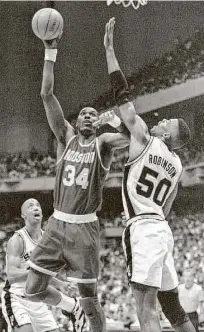  ?? Brian Bahr / Getty Images ?? Hakeem Olajuwon led the Rockets with 41 points to give Houston a 2-0 lead in the 1995 Western Conference finals.