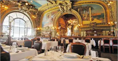  ?? THINKSTOCK. COM ?? Le Train Bleu ( above), Moulin Rouge and the Hemingway Bar in the Ritz Hotel are all worth seeing.