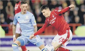  ??  ?? Joe Lolley (right) in action for Nottingham Forest.