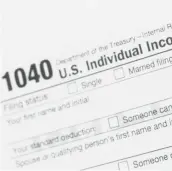  ?? AP2018 ?? The upcoming tax filing season will be unique due to rampant unemployme­nt, working fromhomean­d general upheaval due toCOVID-19MARKLENN­IHAN/