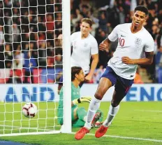  ?? Reuters ?? England’s Marcus Rashford celebrates scoring the only goal in the 1-0 win over Switzerlan­d.