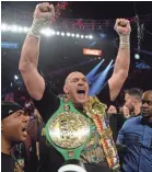  ?? JOE CAMPOREALE/USA TODAY SPORTS ?? Tyson Fury celebrates after defeating Deontay Wilder in their WBC heavyweigh­t title bout.