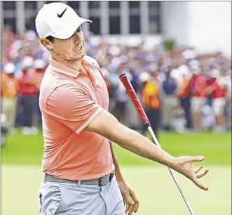  ?? REUTERS ?? Rory McIlroy misses putt on 18th green during playoff against Graeme Storm.