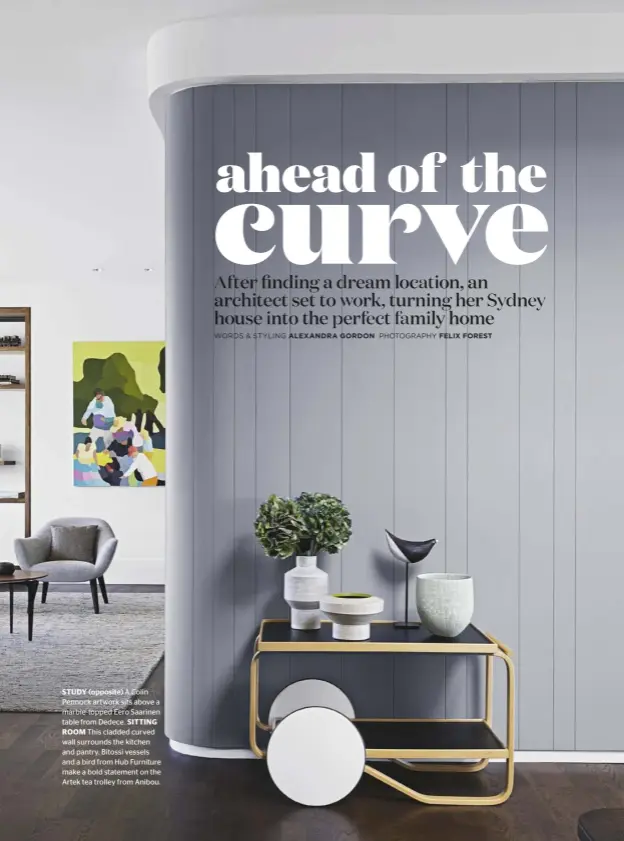  ??  ?? STUDY (opposite) A Colin Pennock artwork sits above a marble-topped Eero Saarinen table from Dedece. SITTING
ROOM This cladded curved wall surrounds the kitchen and pantry. Bitossi vessels and a bird from Hub Furniture make a bold statement on the...