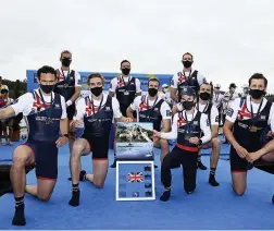  ??  ?? Josh Bugajski, Mohamed Sbihi, Tom George, Thomas Ford, Charles Elwes, Henry Fieldman, James Rudkin, Oliver Wynne-griffith and Jacob Dawson celebrate on the podium after winning gold in the men’s eight in Varese