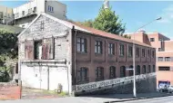  ?? PHOTO: GREGOR RICHARDSON ?? Student design award . . . A former furniture workshop building, 232 Rattray St was recently bought with a view to sensitivel­y adapting and developing the site. It was chosen as the location for students from the Otago Polytechni­c’s school of design to enter ideas for the adaptive reuse of the building. Student Ilan Avraham was awarded the student design award for his entry.