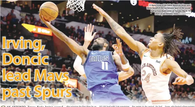  ?? AFP PHOTO ?? Kyrie Irving of the Dallas Mavericks drives past Devin Vassell of the San Antonio Spurs in the second half at Frost Bank Center on Tuesday, March 19, 2024, in San Antonio, Texas.