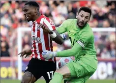  ?? ?? CLASH OF THE TITANS: Brentford striker Toney (left) and Lloris