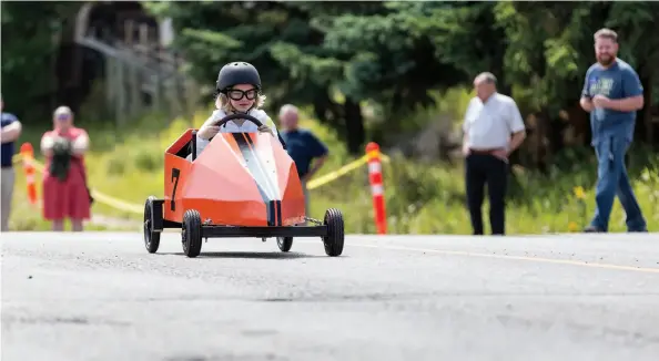  ?? CITIZEN PHOTO BY JAMES DOYLE ?? A derby car races down Victoria Street on Saturday afternoon during the 2019 Prince George Soap Box Derby.