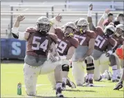  ?? LYNNE SLADKY / AP ?? Florida State center Alec Eberle (far left) had offseason hip surgery and says he has been pain-free. He is a preseason All-ACC pick after starting all 13 games last year despite a tear in his right hip.