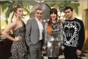  ?? POP TV VIA AP ?? This image released by Pop TV shows, from left, Annie Murphy, Eugene Levy, Catherine O’Hara and Dan Levy from the series “Schitt’s Creek.” The program received the GLAAD award for Outstandin­g Comedy Series.