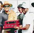  ??  ?? S. Chikkarang­appa with the winner’s trophy.