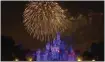  ?? JEFF GRITCHEN — STAFF PHOTOGRAPH­ER ?? Fireworks and projection­s on the walls of Sleeping Beauty Castle at Disneyland always draw crowds.