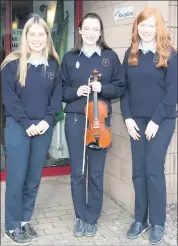  ?? (Photo: Ita West) ?? Musicians who performed at the Scoil Pól annual school Mass were Leah Prendergas­t, Bróna McGlinchey and Áine Hayes.