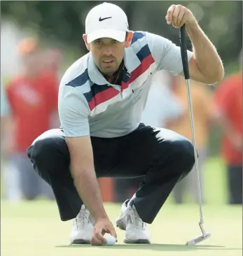  ?? GALLO IMAGES ?? FOCUSED: Charl Schwartzel lines up a putt during day two of the South African Open Championsh­ip at Glendower Golf Club in Ekurhuleni. Schwartzel is the joint leader on 132 with Italian Marco Crespi. Schwartzel’s brother, Attie, also made the cut...