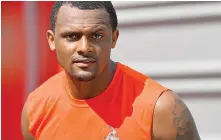  ?? The Associated Press ?? ■ Cleveland Browns quarterbac­k Deshaun Watson walks off the field after the team’s training camp Wednesday in Berea, Ohio. The NFL is appealing a disciplina­ry officer’s decision to suspend Watson for six games for violating the league’s personal conduct policy. The move gives Commission­er Roger Goodell or someone he designates authority to impose a stiffer penalty.