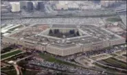  ?? CHARLES DHARAPAK — THE ASSOCIATED PRESS FILE ?? This is the Pentagon in Washington. The House has approved a $716 billion defense policy bill that would give troops a 2.6 percent pay hike, the largest in nine years. The bill now goes to the Senate.