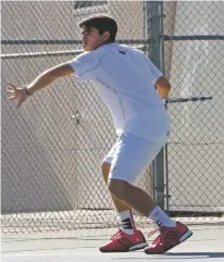  ?? WILL WEBBER/THE NEW MEXICAN ?? Robertson’s Andres Garcia prepares to return a shot during Thursday’s Class 1A-4A singles state finals against Hope Christian’s Adomas Skauda. Skauda won in straight sets, 6-2, 6-1.