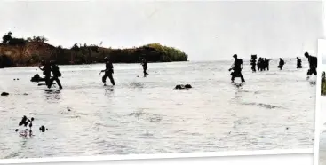  ??  ?? Above: The second wave of Raiders wade ashore during the invasion of Tulagi Island