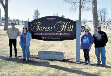  ?? COURTESY OF TROOP 41 ?? Patrick Edwards, left, is shown with his mom Trisha and his father Joe, far right, and his sister Jasmine at Forest Hill Cemetery in Fitchburg where Patrick completed his Eagle Scout project.