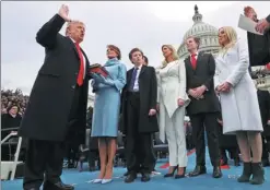  ?? JIM BOURG / REUTERS ?? US President Donald Trump takes the oath of office during his inaugurati­on ceremony in Washington on Jan 20.