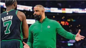  ?? Steven Senne / Associated Press ?? Just as he surprised everyone but himself by becoming a rotation player for the defending champion Spurs in 2007-08, Celtics coach Ime Udoka has guided an unlikely turnaround in Boston.
