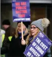  ??  ?? Picket line protesters