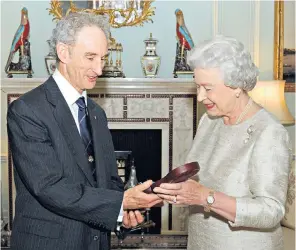  ??  ?? Lord May of Oxford being invested with the OM by the Queen and, below, right, in 2002 as President of the Royal Society, with his successor as Chief Scientific Adviser, Professor David King (left) and Prime Minister Tony Blair