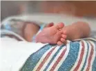  ?? MIKALA COMPTON/USA TODAY NETWORK ?? In the United States, 1 in 10 babies is born prematurel­y. But it’s the only high-income country that does not have mandatory paid leave for parents after a child’s birth or adoption.