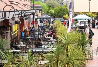  ?? SHERRY LAVARS — MARIN INDEPENDEN­T JOURNAL ?? Customers dine at City Plaza in San Rafael in May. The Downtown San Rafael Business Improvemen­t District has about 700members.