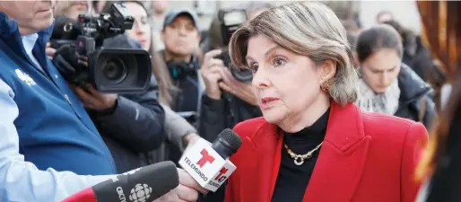  ??  ?? ↑
Women’s rights attorney Gloria Allred speaks to reporters outside a Manhattan courthouse in New York on Monday. Associated Press