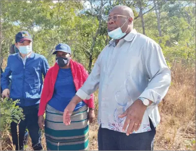  ?? ?? Tsingshan Investment­s Zimbabwe chief executive officer Benson Xu (left) takes government officials on a tour of the steel plant site in Mvuma