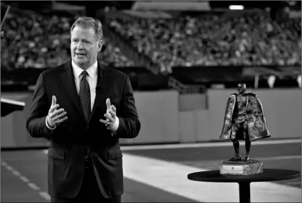  ?? AP Photo/Charlie Riedel ?? Commission­er Roger Goodell talks about the Walter Payton NFL Man of the Year award during the NFL Honors ceremony as part of Super Bowl 55 on Feb. 5 in Tampa, Fla.