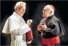  ??  ?? Confession time: Anton Lesser (left) and Nicholas Woodeson as popes Benedict XVI and Francis in a play about the 2013 resignatio­n that shocked the world