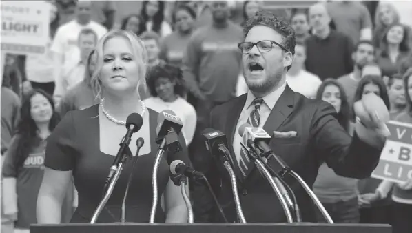  ?? ANHEUSER-BUSCH VIA AP ?? U.S. Super Bowl ads like this one by Anheuser-Busch, showing actors Amy Schumer and Seth Rogen, might be seen by Canadians if a CRTC ruling is upheld.