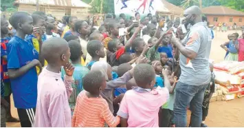  ??  ?? National Coordinato­r, Community Sport and Educationa­l Developmen­t ( CSED), Edema Fuludu, at the IDPS Camp Uhogua, Edo State to celebrate events marking April 6 Internatio­nal Day of Sport for Developmen­t and Peace