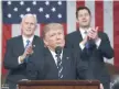  ?? — AFP ?? US President Donald J. Trump reacts after delivering his first address to a joint session of Congress from the floor of the House of Representa­tives in Washington,DC.