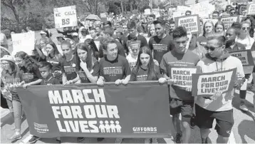  ?? CARLINE JEAN/SOUTH FLORIDA SUN SENTINEL FILE ?? The March for Our Lives demonstrat­ion, advocating for stricter gun control legislatio­n, is led by students from Marjory Stoneman Douglas High School in Parkland.