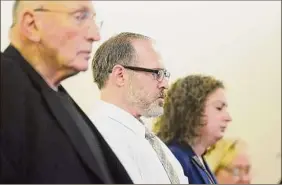  ?? Paul Buckowski / Times Union archvie ?? Paul Barbaritan­o, center, appears in Albany County Court with his attorneys, Michael Feit, left, and Rebekah Sokol, right, on Jan. 15, 2020, in Albany.