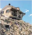  ?? FOTO: DPA ?? Trümmer in der vom Erdbeben zerstörten Stadt Amatrice – aufgenomme­n ein Jahr nach dem ersten Beben.