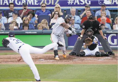  ?? Charlie Neibergall / Associated Press 2012 ?? Sandoval hits a basesloade­d triple off the American League’s Justin Verlander in the first inning of the 2012 AllStar Game, presaging their matchup when the Giants beat the Tigers in the World Series that fall.
