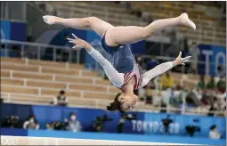  ?? THE ASSOCIATED PRESS NATACHA PISARENKO — ?? Sunisa Lee, of the United States, performs on the balance beam during the artistic gymnastics women’s all-around final at the 2020 Summer Olympics Thursday in Tokyo.