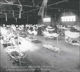  ?? Butler Center for Arkansas Studies ?? Soldiers convalesce from the so-called “Spanish flu” in September 1918 in an overflow ward of the hospital at Eberts Field in Lonoke.