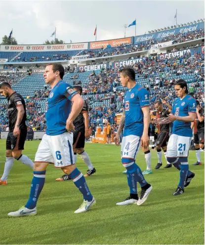  ??  ?? Jugadores de La Máquina, antes del juego contra Atlas de la Jornada 9