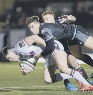  ??  ?? 0 Seen here tackling Blair Kinghorn, Huw Jones looked a lot more like his old self at the weekend.