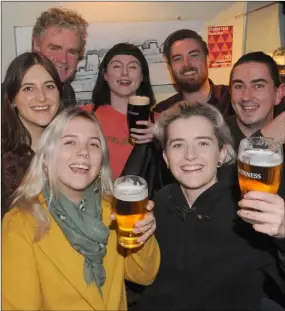  ??  ?? Mark Dearey with a group celebratin­g during the 20th anniversar­y night of The Spirit Store opening.