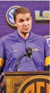  ?? AP FILE PHOTO/BUTCH DILL ?? LSU men’s basketball coach Will Wade has been dealing with allegation­s of recruiting violations since March 2019 and was suspended during the postseason last year, but so far the former UTC and VCU coach has kept the job he took before the 201718 season.